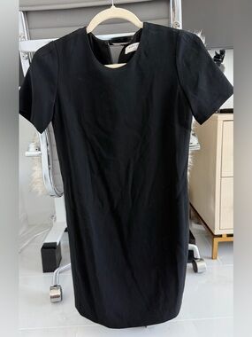 Aritzia Black Labeled Garment with Cream Tag